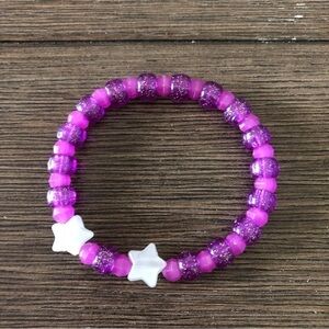 purple stretch bracelet with stars